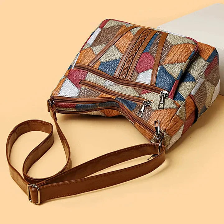 Bolso de mano de piel con mosaico